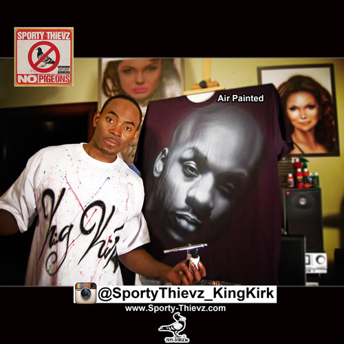 King Kirk standing beside a wall of painted portraits and a Sporty Thievz poster